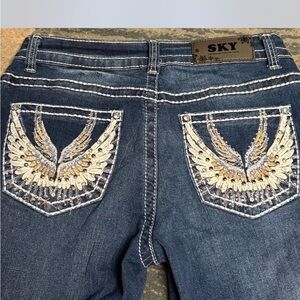 Classic Blue Denim low rise flare Jeans w decals on pockets